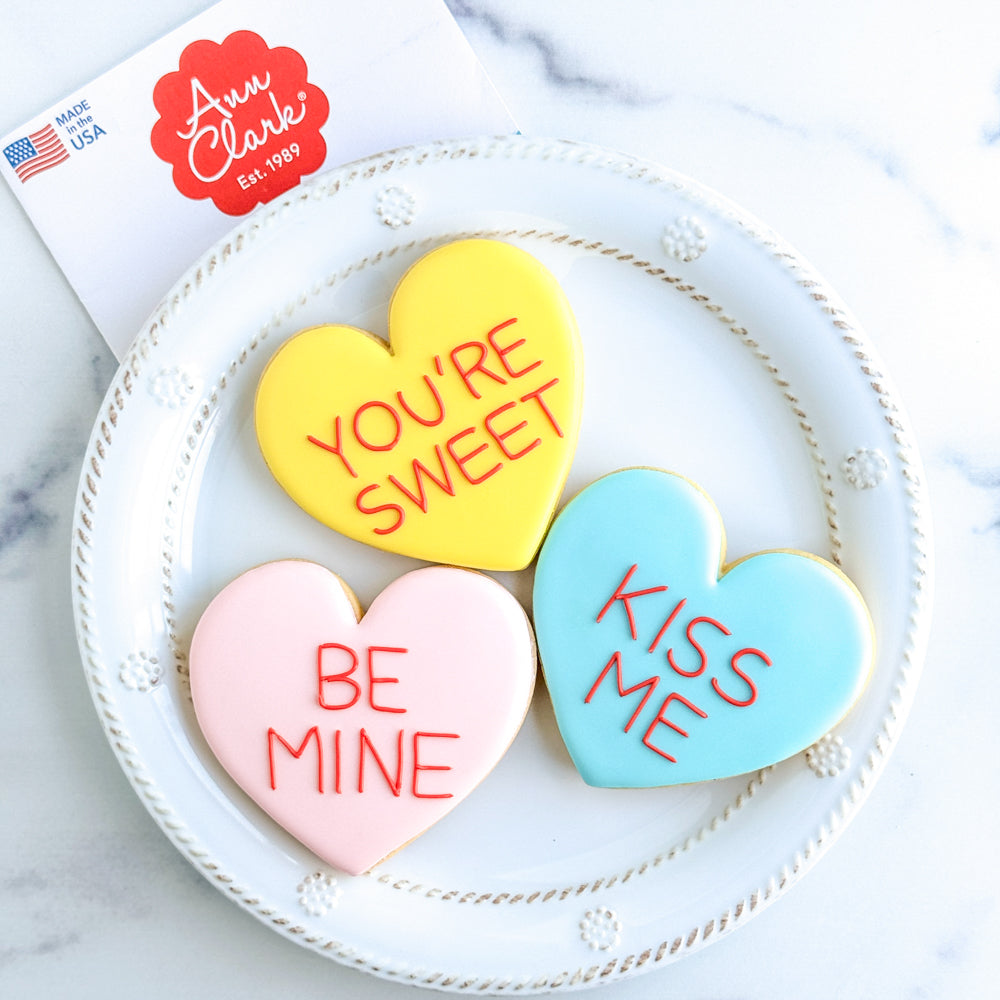 image of three frosted heart sugar cookies