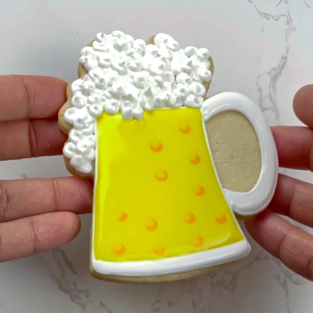 image of beer mug sugar cookie with royal icing 