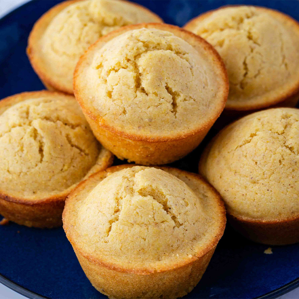 Cornbread muffins on a blue plate