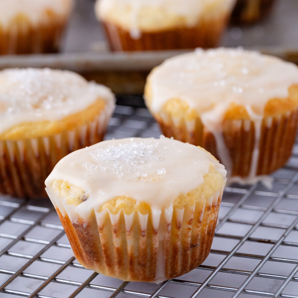 Cranberry orange muffins on a cooling rack