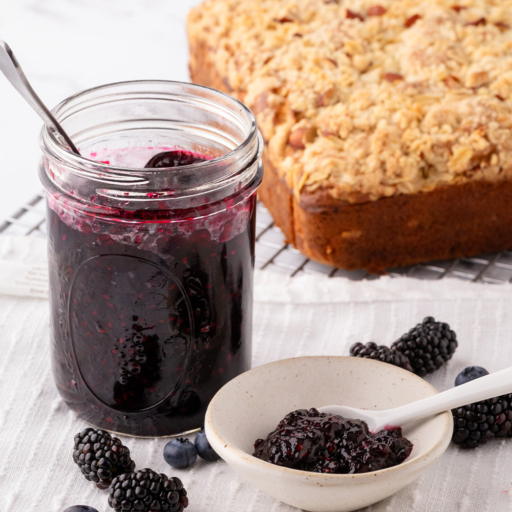 Jar and bowl of berry jam