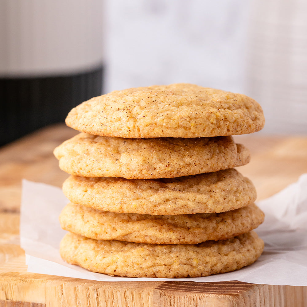 Stack of cookies on a piece of parchment paper