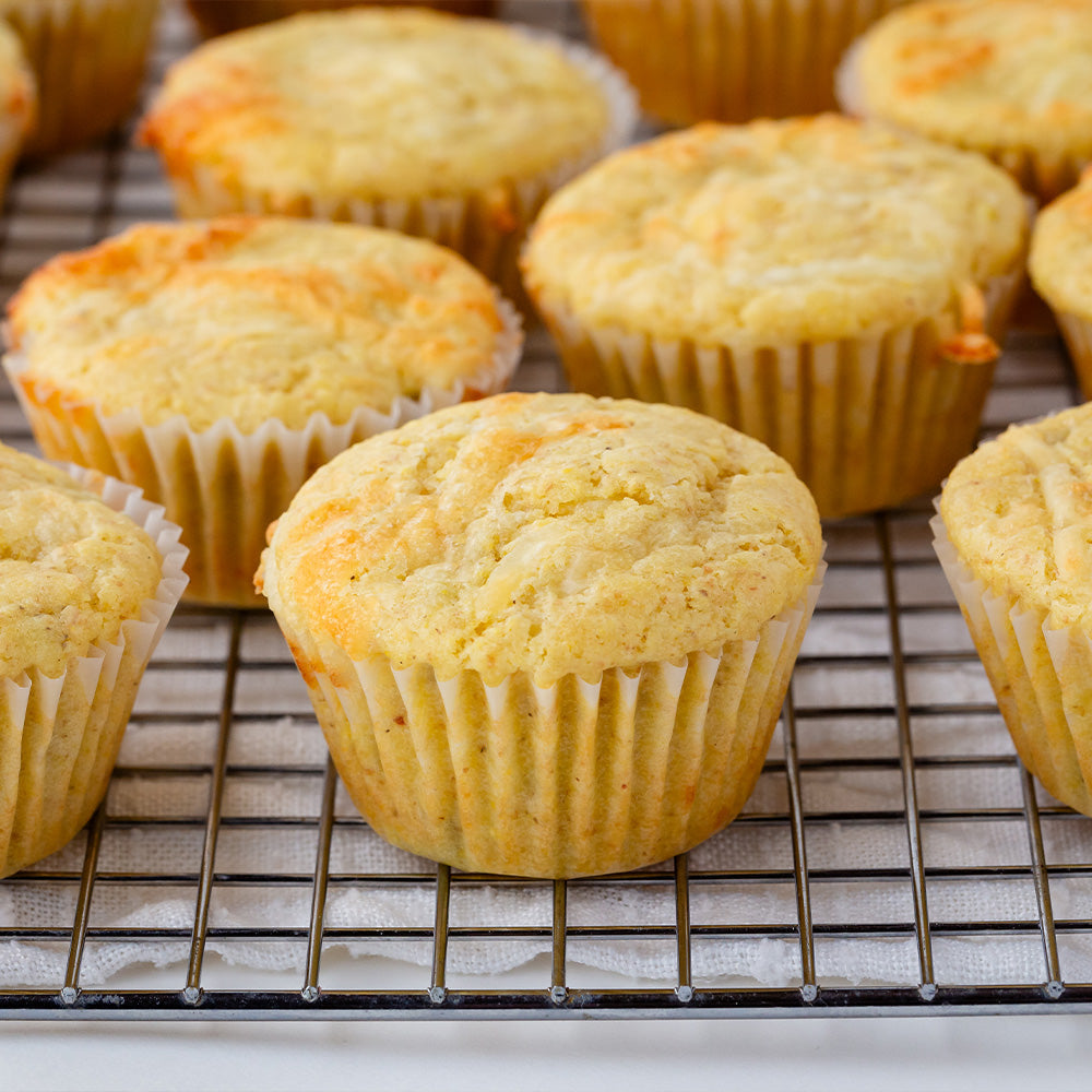 Cornbread muffins on a wire cooling rack