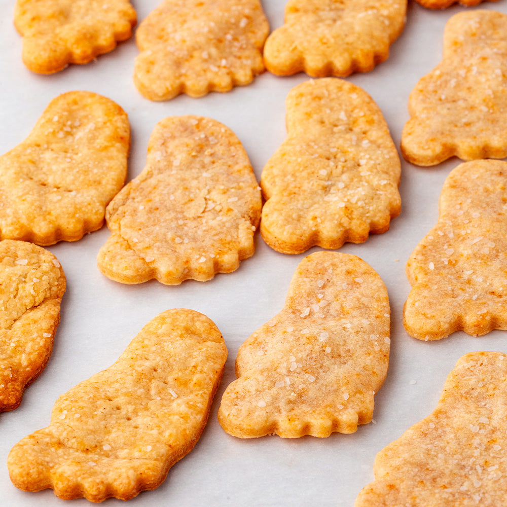 Cheesy feet crackers on parchment paper