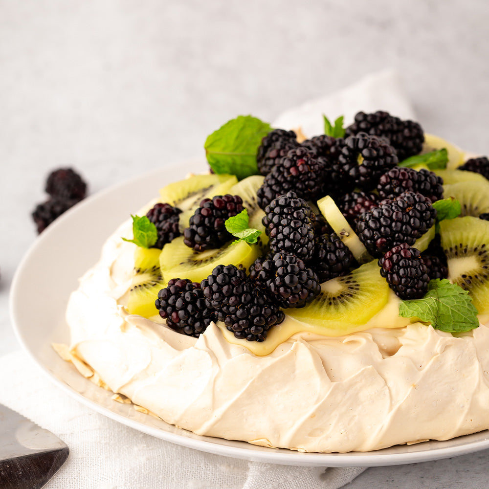 Pavlova with Lemon Curd & Seasonal Fruit