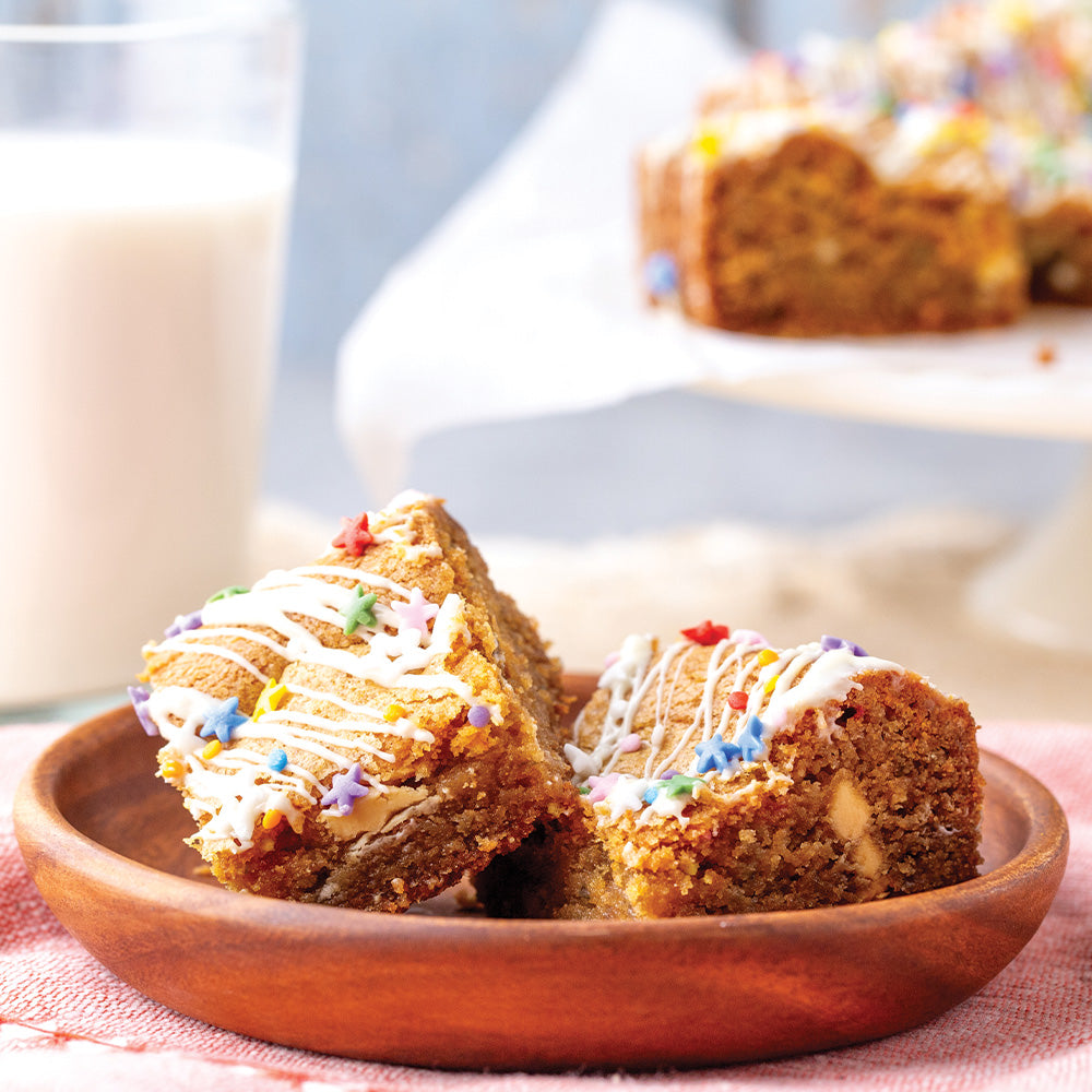 Confetti cookie bars in a wooden bowl