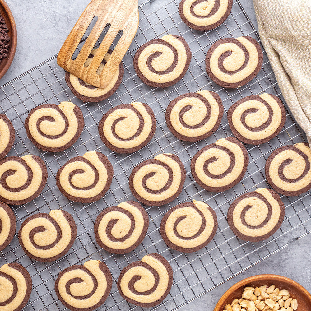 Pinwheel cookies on a wire cooling rack