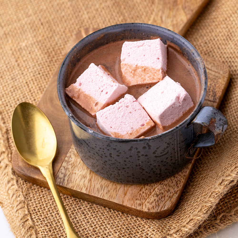 Mug of hot cocoa with strawberry marshmallows